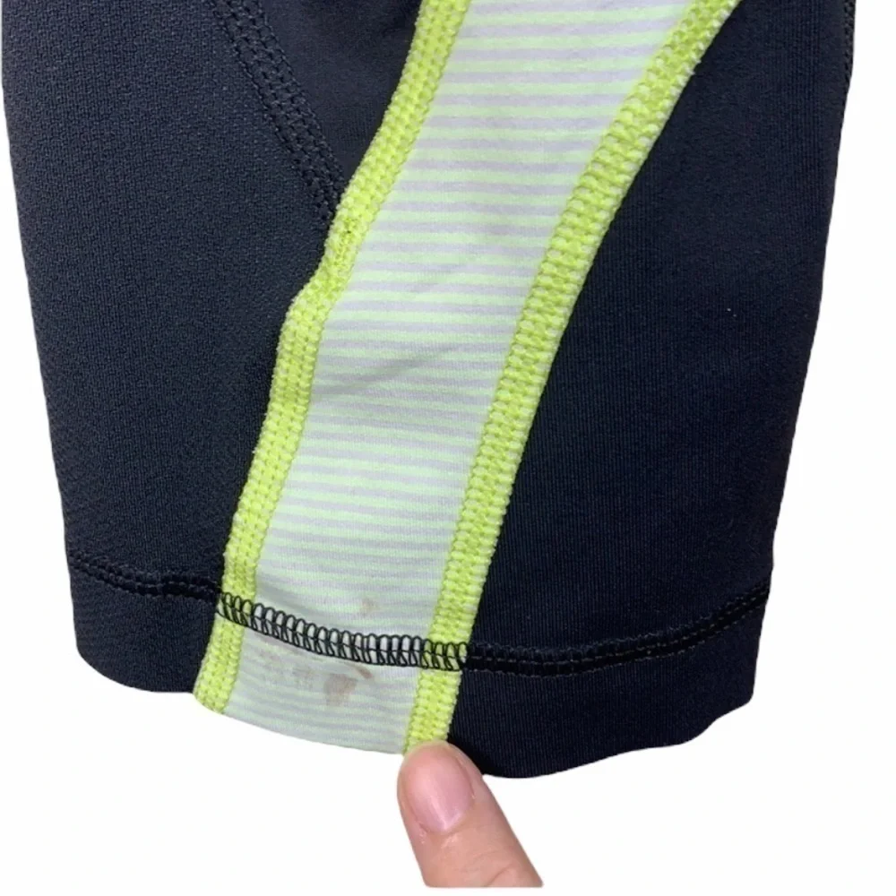 Lululemon black and yellow skull soul cycle crops